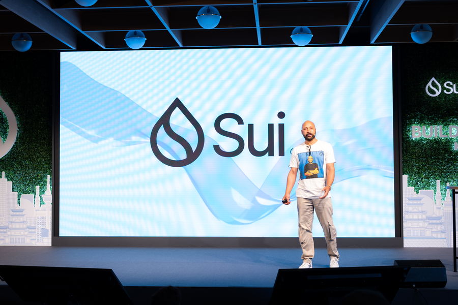 Sui Builder House Kyoto — opening talk on the main stage with Sui brand screen graphics