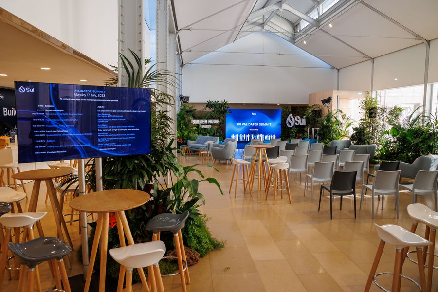 Sui Validator Summit Paris — Builder House venue, stage, and wayfinding screens
